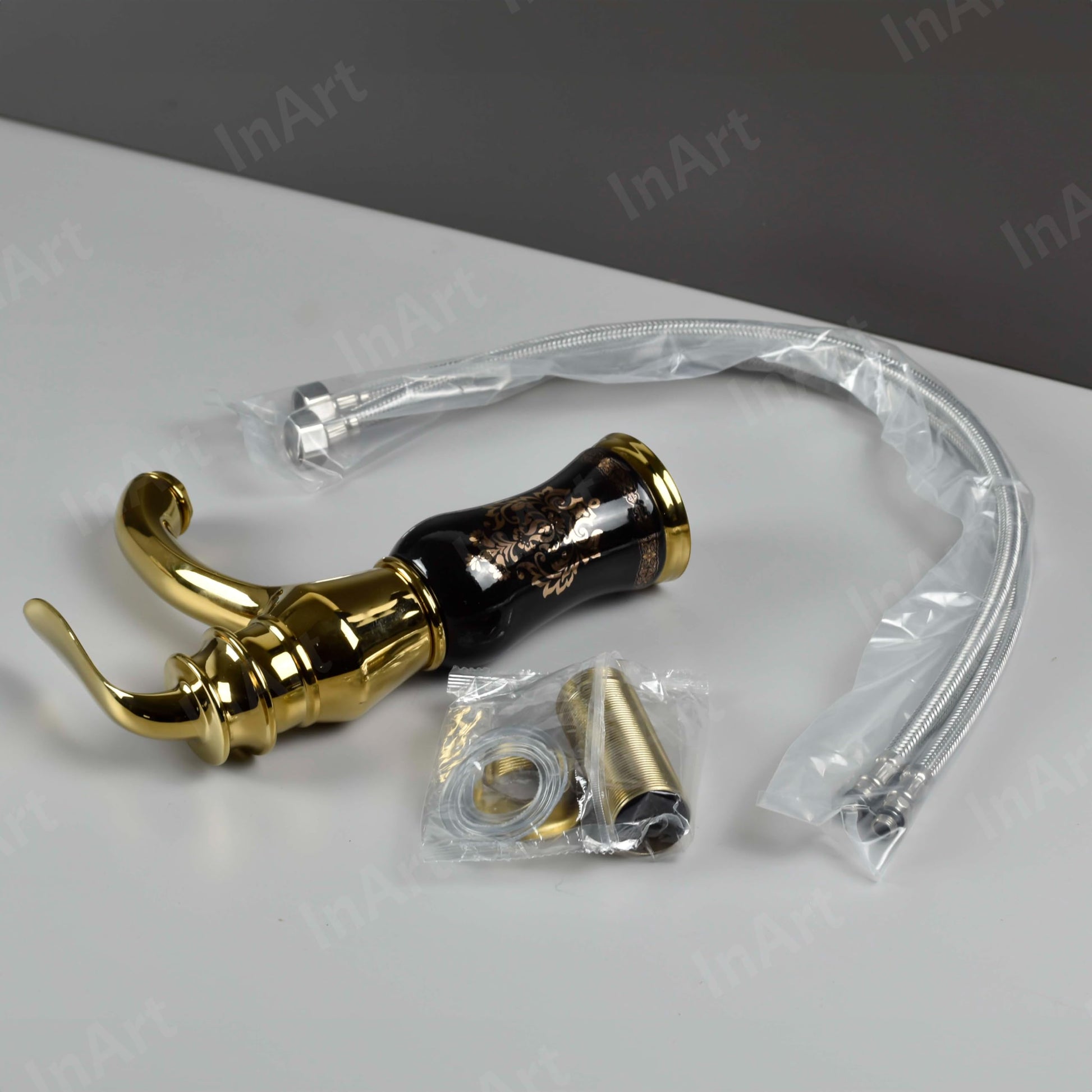 InArt single lever basin mixer tap black gold, top view of waterfall outlet for hot and cold water mixer