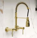 InArt sink mixer wall mounted brass kitchen tap in brushed gold with 360° swivel pull-out sprayer, front view