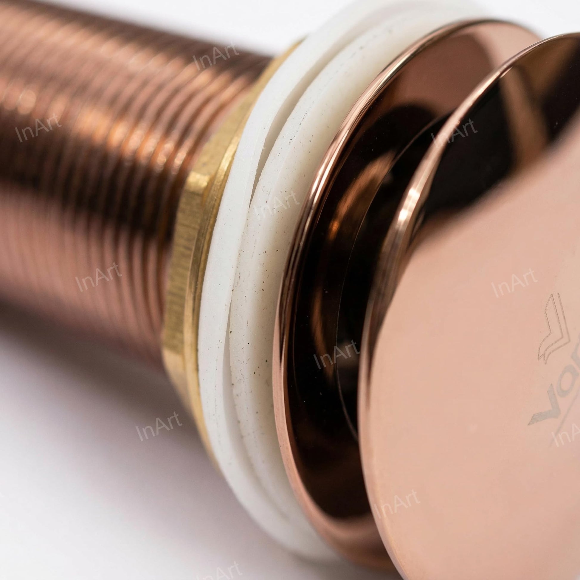 Top view of pop-up cap and flange, wash basin waste coupling rose gold for modern bathroom basins