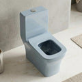 Light blue ceramic one piece western commode, floor mounted S-trap water closet angled side view