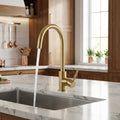 InArt kitchen faucet with sprayer style pull down spout, brushed gold sink tap close-up detail