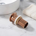 Stainless steel wash basin coupling with rose gold surface detail