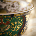 Square table top wash basin counter design in ceramic, glossy finish with vibrant multi colour detailing