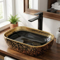 InArt wash basin countertop, oval ceramic table top basin in glossy black and gold, front view