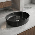 Oval counter top wash basin in matte black finish on vanity counter