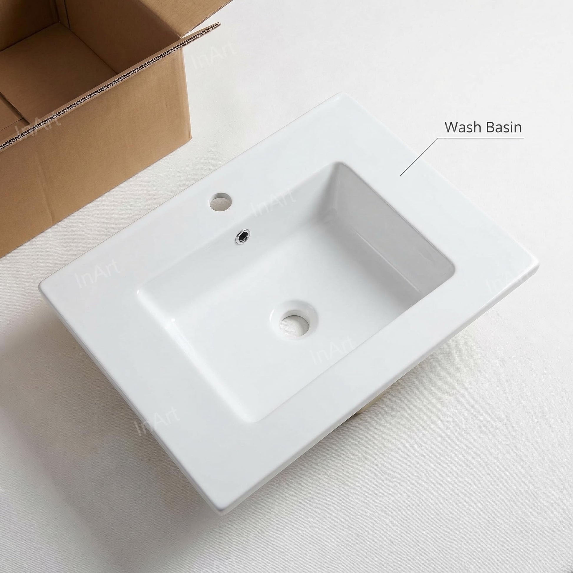 InArt under counter wash basin in bathroom interior, glossy super white ceramic rectangular sink with tap cutout