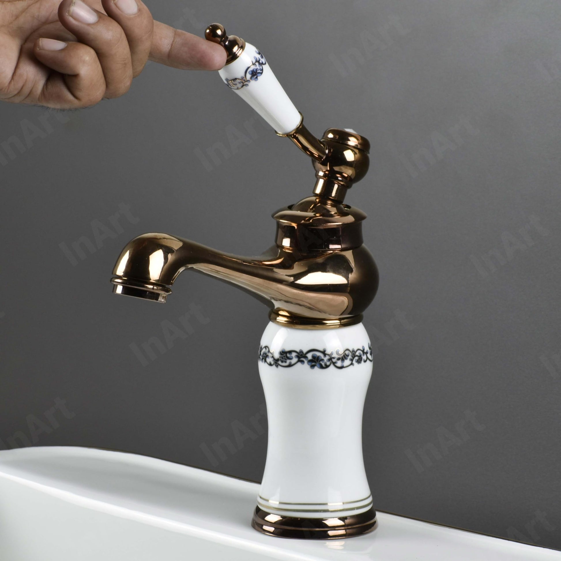 InArt waterfall basin tap in rose gold for premium bathroom interior, table mount single lever mixer
