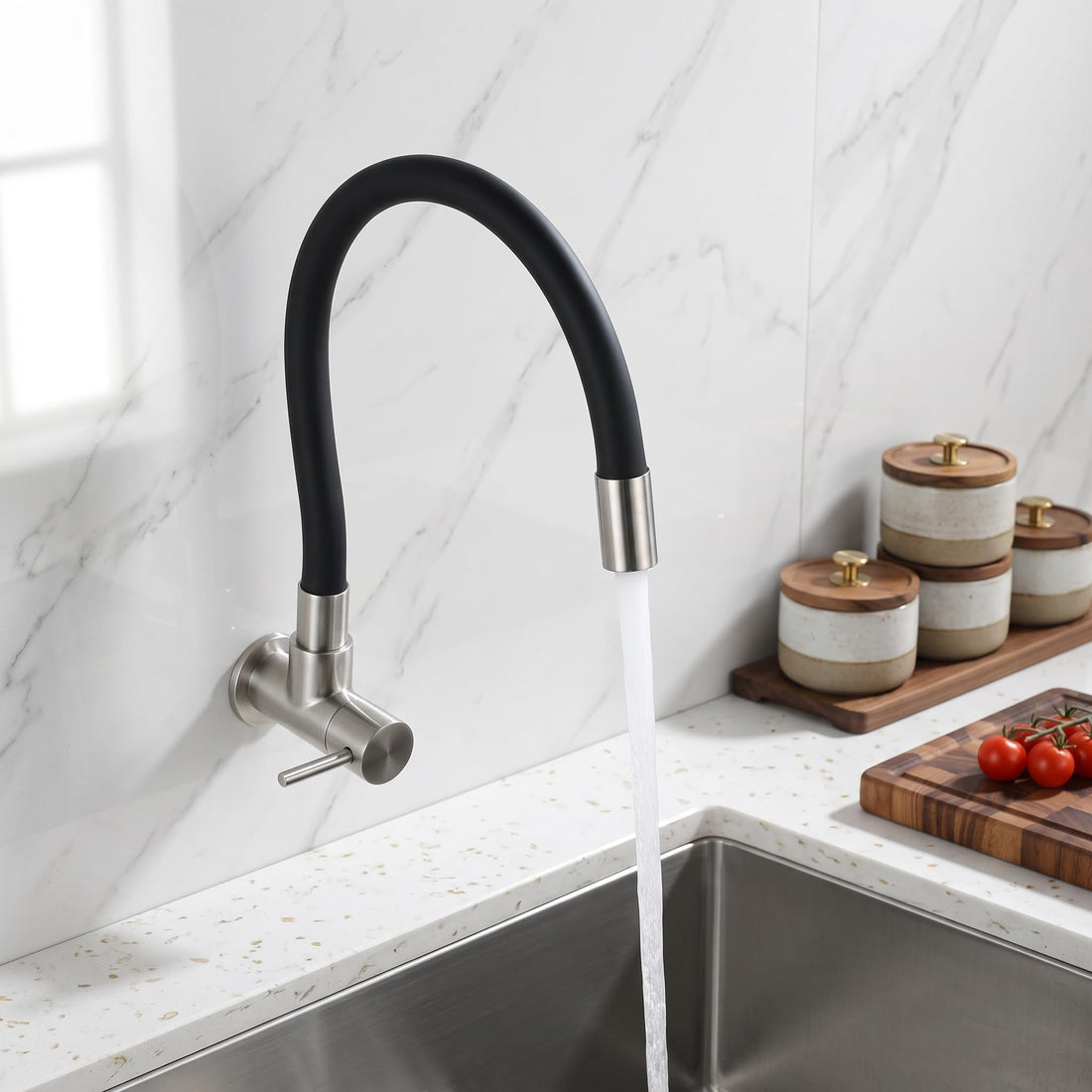 Wall mounted kitchen tap with brushed steel body and matte black flexible swing spout