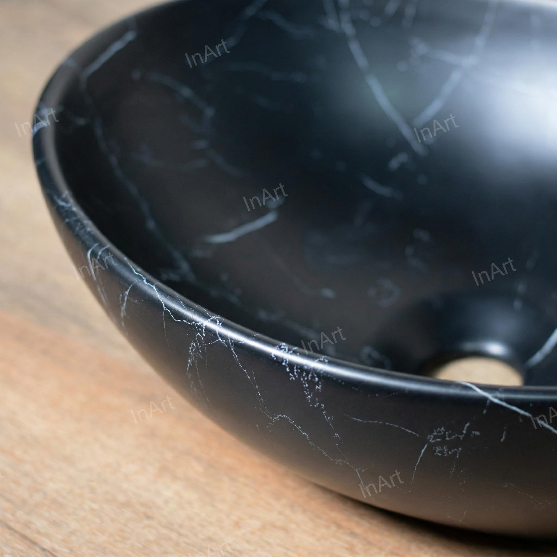 Ceramic counter top wash basin in matt black, rectangular bowl depth detail for premium sanitaryware