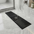 Close-up of anti-foul cockroach trap under square brass floor drain jali, easy-clean design for bathroom