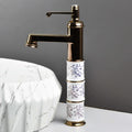Lifestyle bathroom interior with rose gold waterfall wash basin taps, single lever mixer for modern washroom