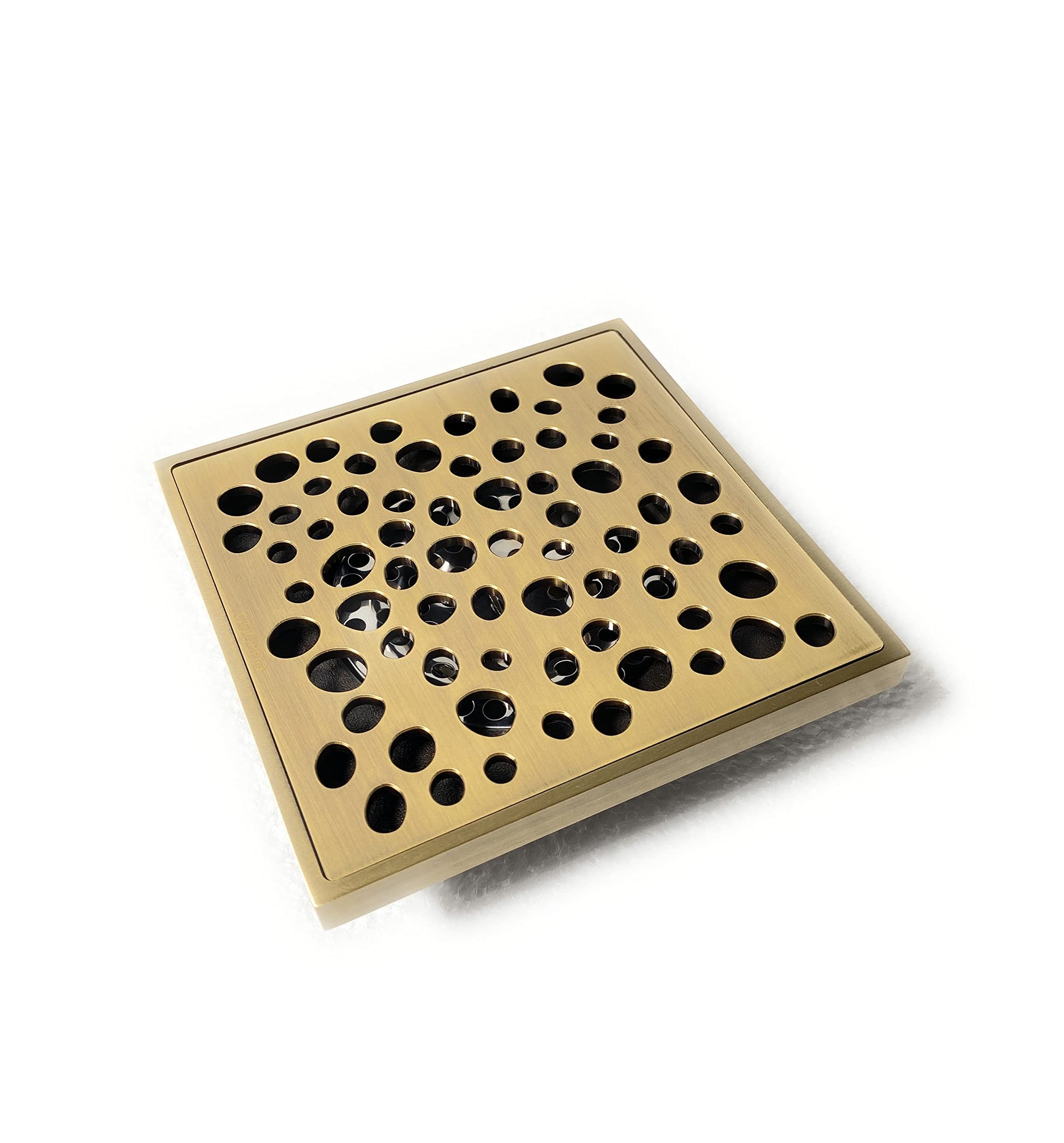 Square antique brass floor drain jali with anti-foul cockroach trap, angled top view for bathroom