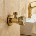 InArt stop cock with flange antique finish in gold, close-up of zinc body and smooth quarter-turn knob