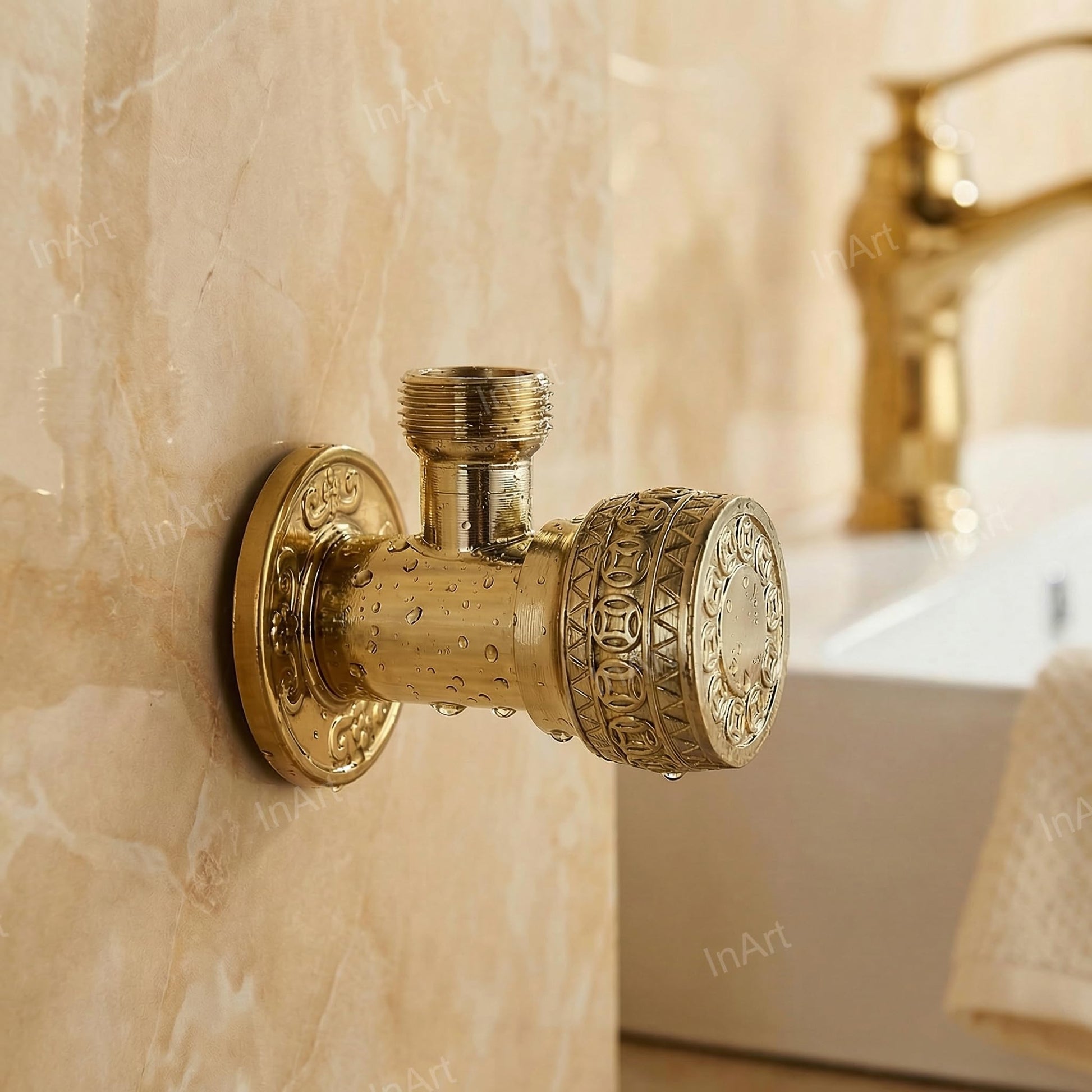InArt stop cock with flange antique finish in gold, close-up of zinc body and smooth quarter-turn knob