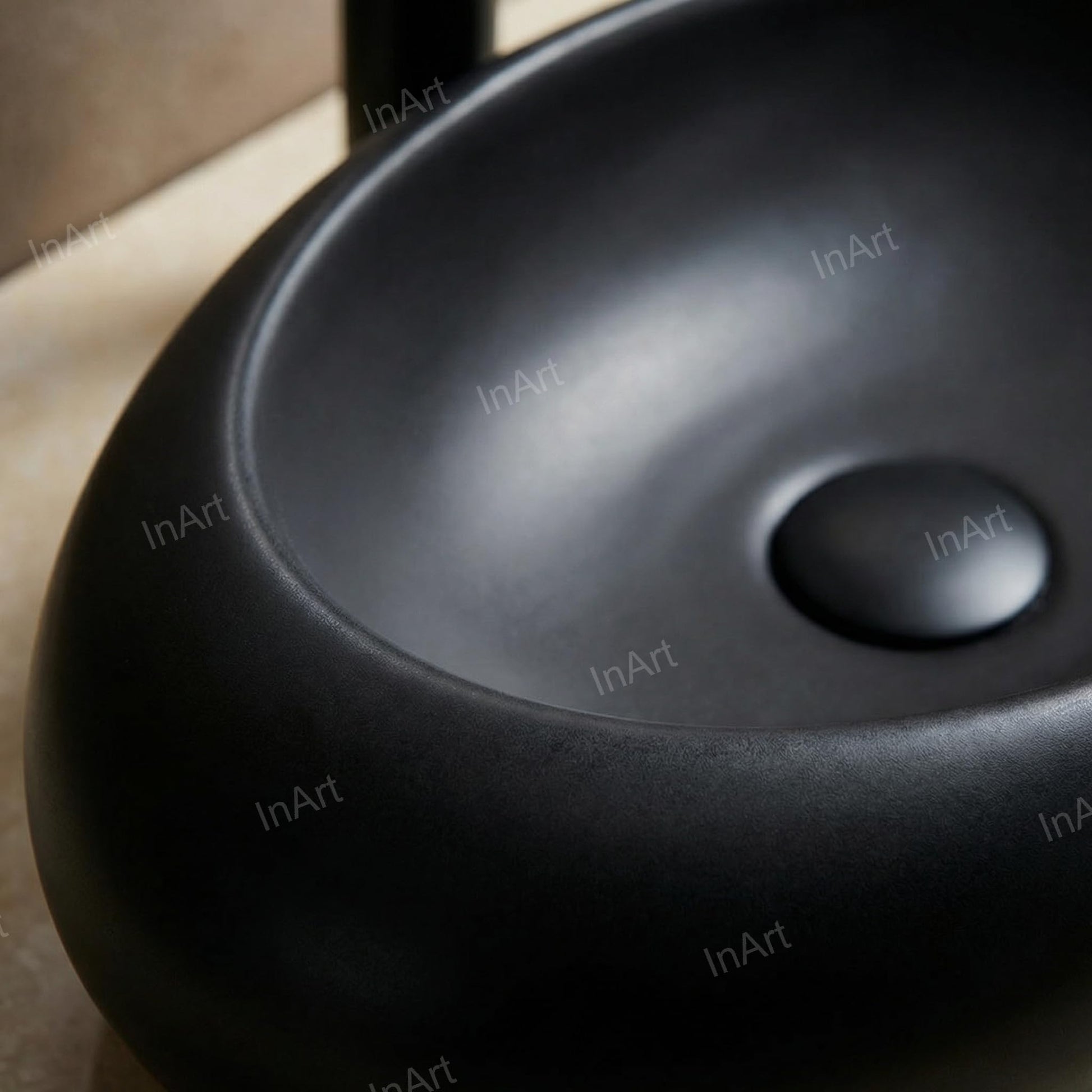 Rectangular table top wash basin in matte black ceramic, smooth rim and deep bowl detail for washroom vanity