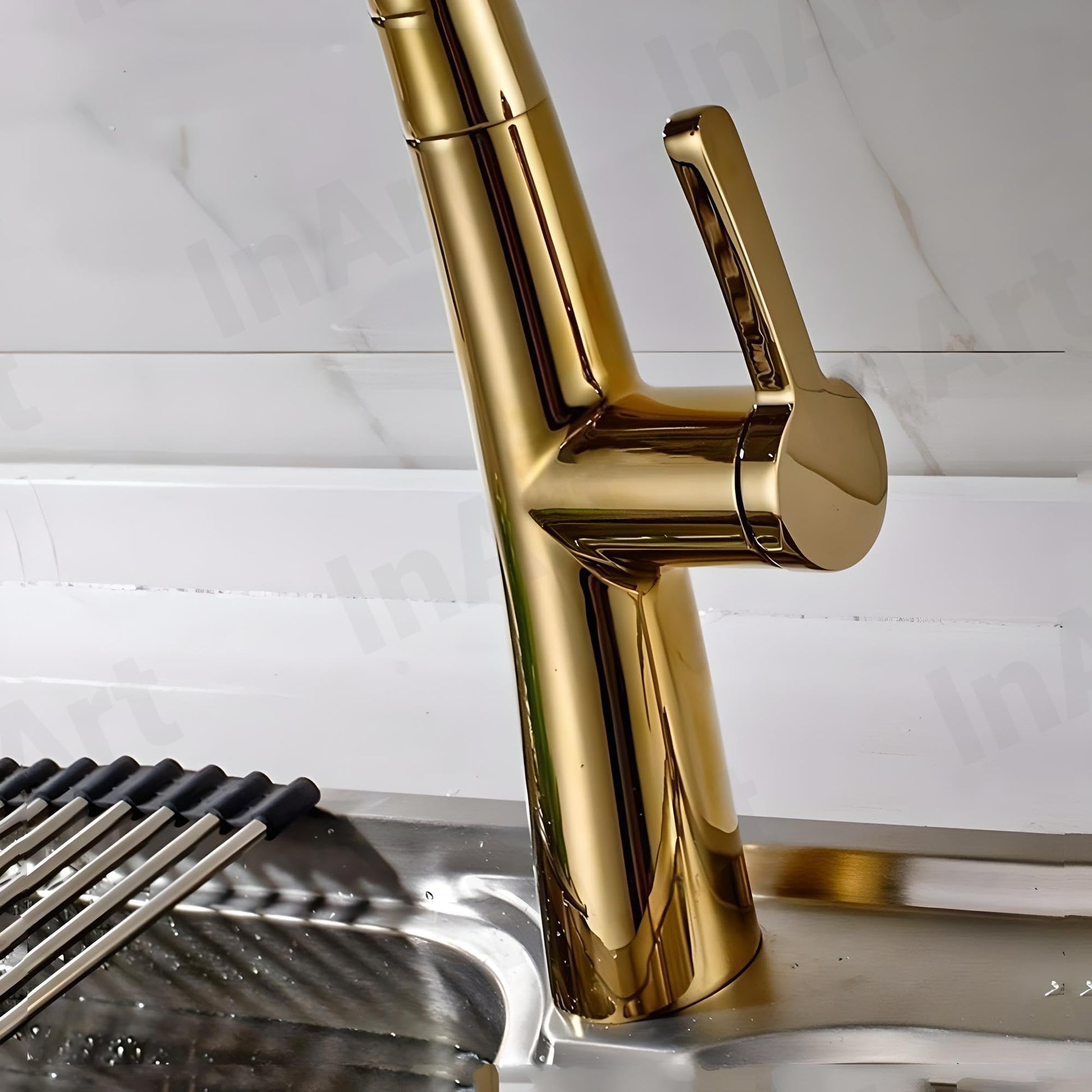 Close-up of InArt gold finish stainless steel sink mixer single lever handle and smooth spout detailing