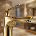 Wash basin mixer tap with single lever control, gold finish for stylish Indian bathroom