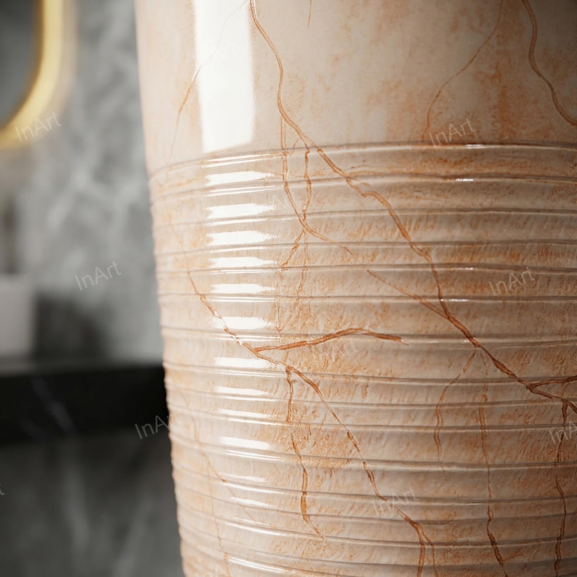 Dining room wash basin area design idea featuring a round ceramic pedestal wash basin in orange marble finish