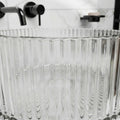 Clear glass wash basin with light-ready look on vanity top, premium round glass countertop basin