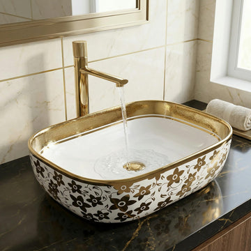 InArt ceramic table top wash basin, oval glossy white with gold rim, main front view