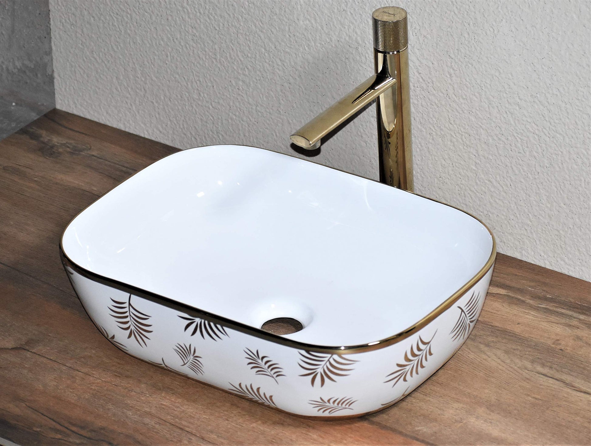 Luxury wash basin by InArt, glossy golden ceramic rectangular table top wash basin for bathroom