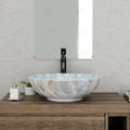 InArt designer ceramic wash basin table top, round light blue glossy finish, angled side view