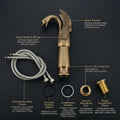 Antique brass swan neck basin tap, side angle view of high neck single lever wash basin mixer for bathroom