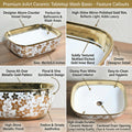 Counter top wash basin in oval ceramic, white with gold finish, side angle for stylish washroom