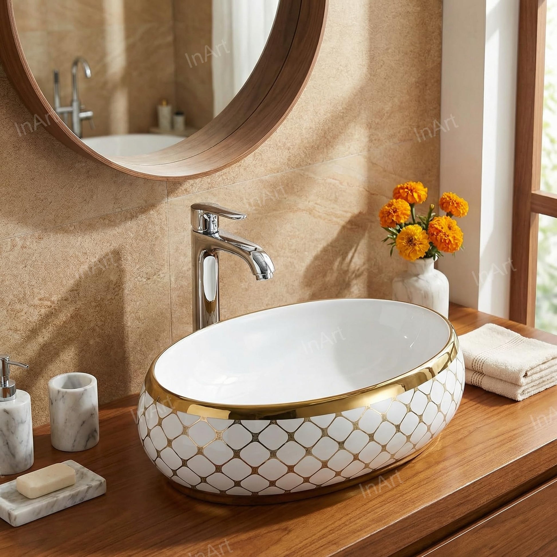 Close-up of InArt premium sanitaryware wash basin showing glossy white finish and golden rim detail