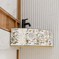 InArt contemporary wash basin for living room or dining area, gold ceramic table top basin in interior setting