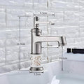 InArt brass basin tap with hot and cold water mixer, single handle control, close-up of waterfall outlet
