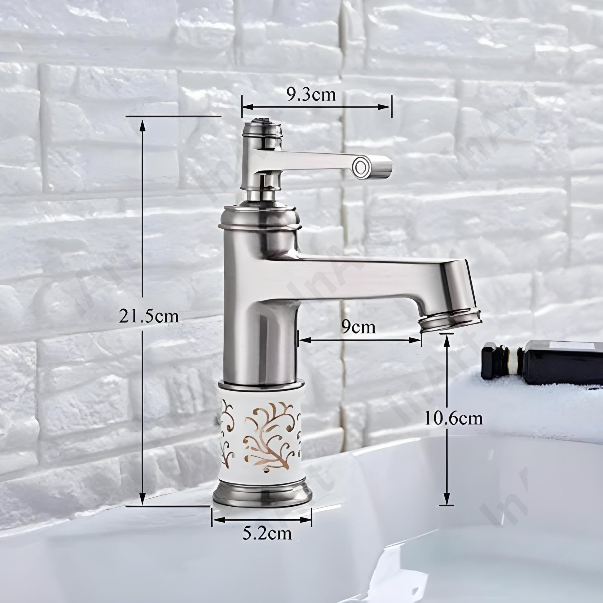 InArt brass basin tap with hot and cold water mixer, single handle control, close-up of waterfall outlet