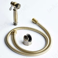 InArt bronze health faucet set shown from side angle, easy grip ABS jet spray for washroom use