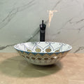 Modern table top wash basin design, printed ceramic round basin in blue yellow, top angle view