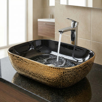 Luxury wash basin by InArt, glossy black gold rectangular ceramic table top wash basin, front view