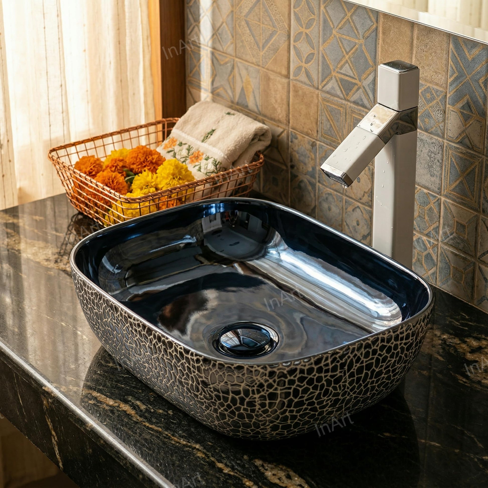 Close-up of glossy blue ceramic wash basin designs with smooth rim, rectangular above counter bathroom basin