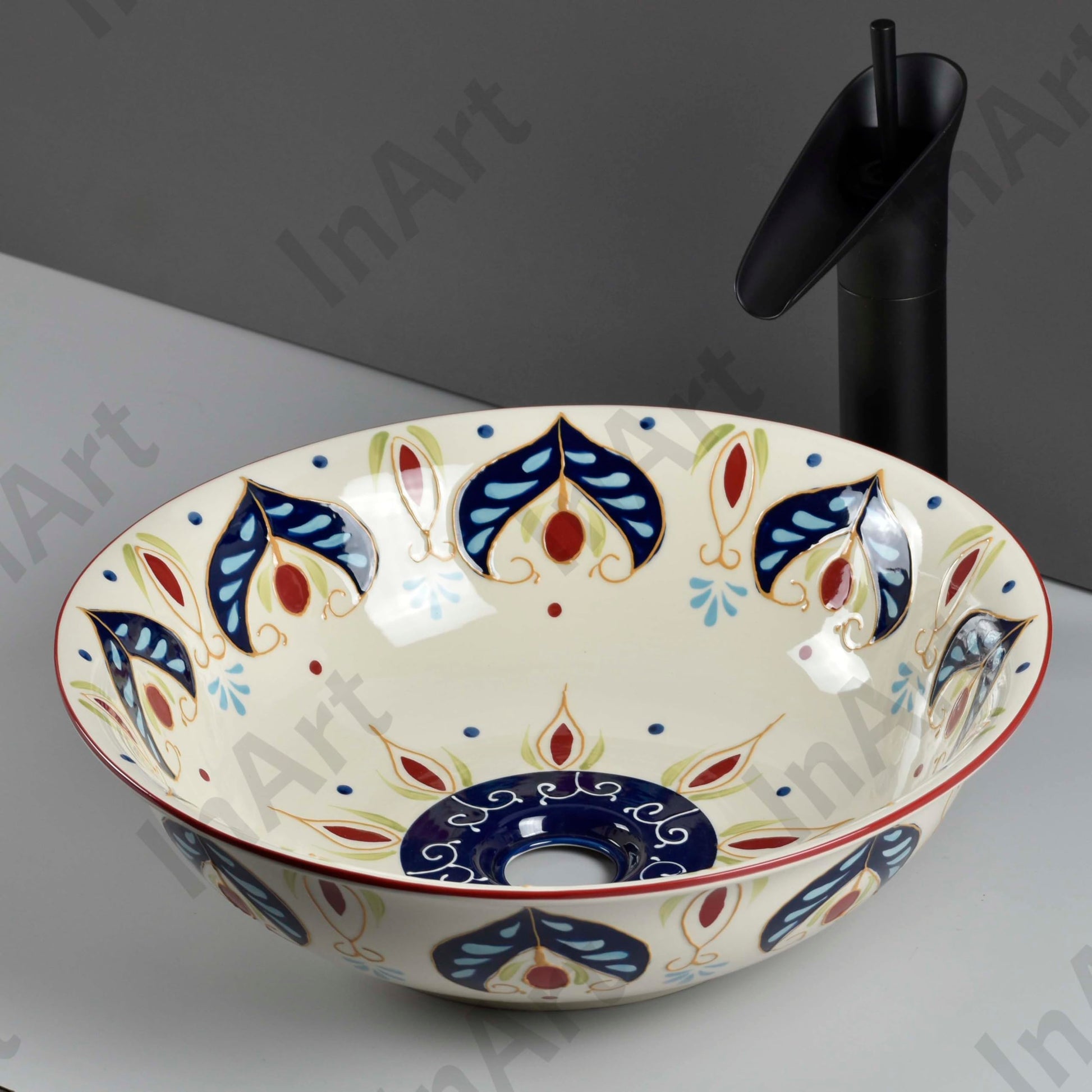Round ceramic basin table top design by InArt, artistic beige blue finish, side angle in bathroom