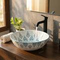 Wash basin design table top with smooth rim detail, light blue glossy ceramic round basin close-up