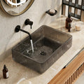 InArt matt black wash basin with sleek rectangular rim, close-up glass finish detail