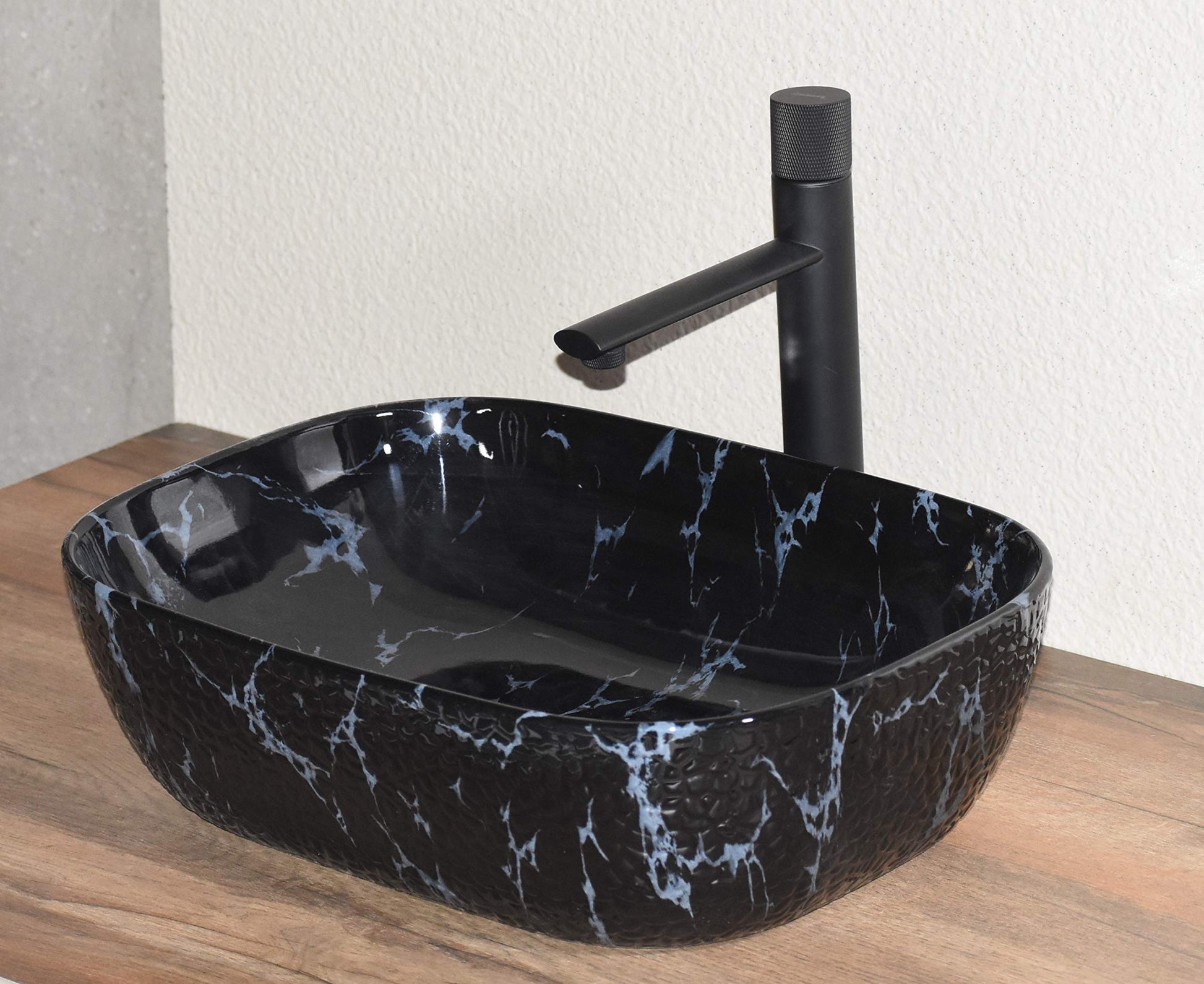 Black ceramic table top wash basin counter design for dining room wash area, premium sanitaryware look