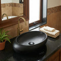 InArt matte black counter top wash basin with tap hole detail, premium ceramic table top basin close-up