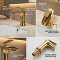 Wash basin mixer single lever with waterfall spout in gold finish, right side angle close-up