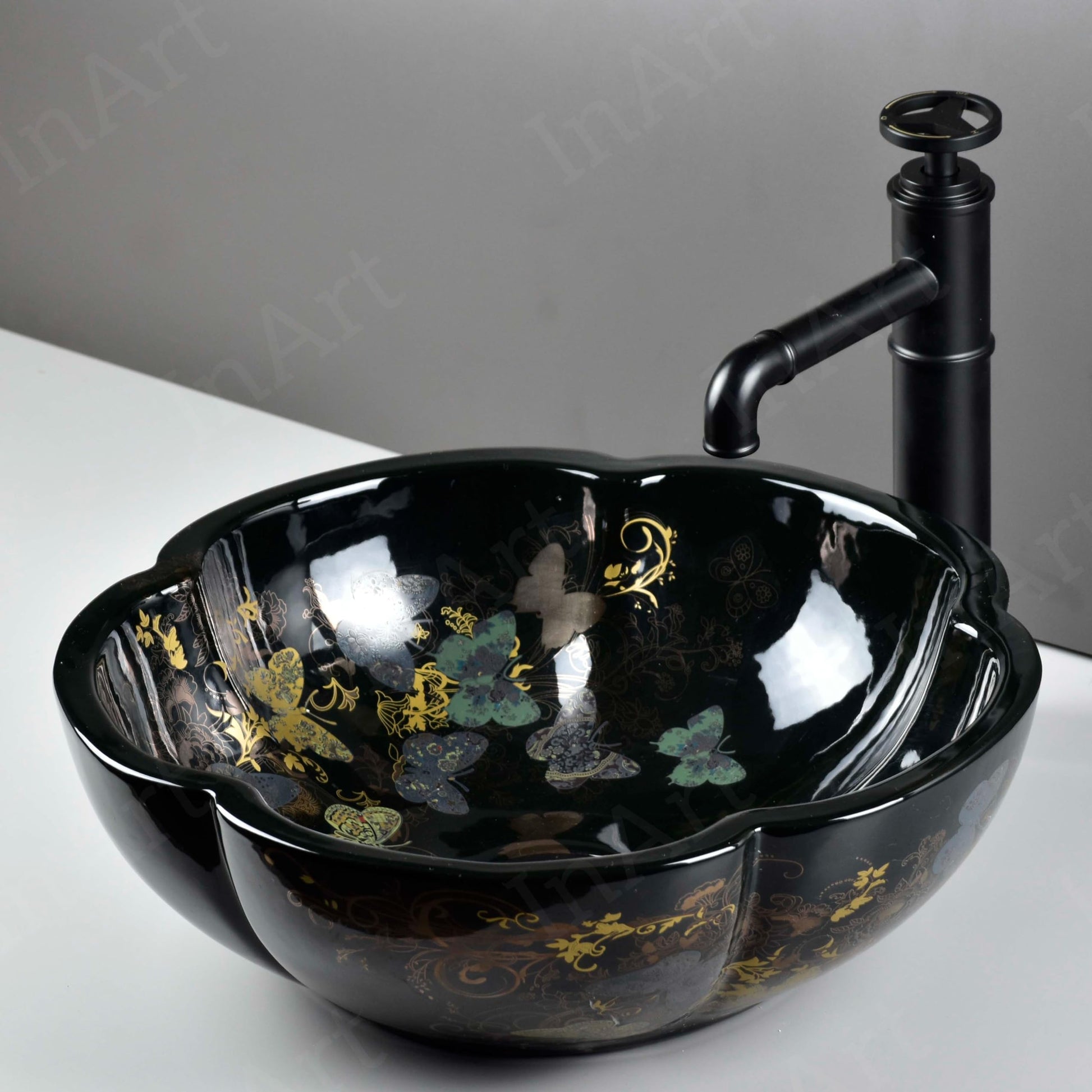 Ceramic wash basin designs in glossy white, oval table top basin shown from top angle for luxury bathroom sinks