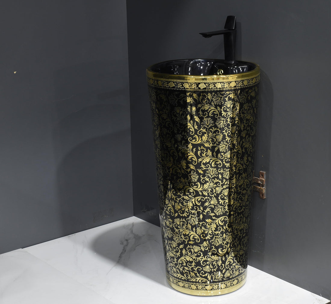 InArt pedestal wash basin designs in glossy black gold ceramic, round free standing basin front view