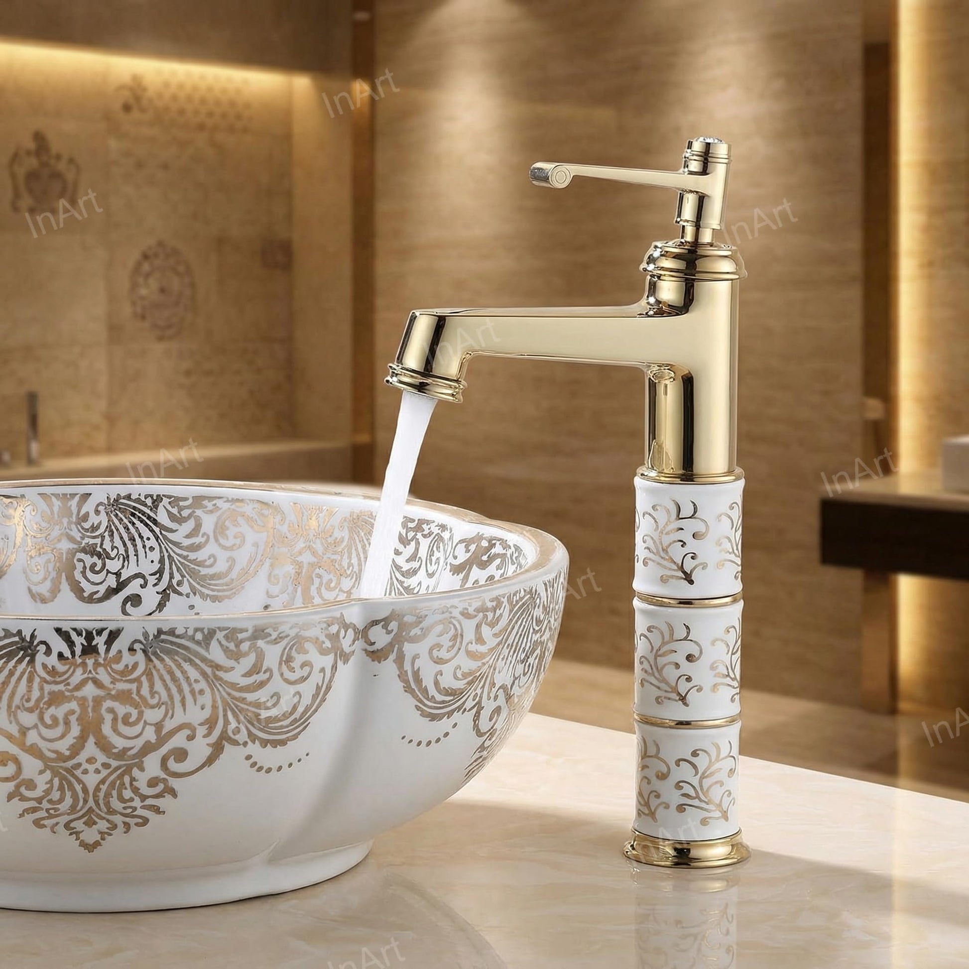 InArt single lever basin tap in golden finish, close-up of brass spout and lever for hot and cold water