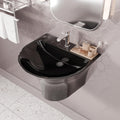 Top view of oval glossy black wash basin with spacious bowl