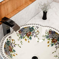 Designer bathroom sinks look with InArt round table top wash basin on vanity, blue floral ceramic