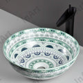 Close-up of InArt light blue ceramic tabletop washbasin design showing smooth glaze and rounded rim