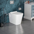 European style floor mounted water closet, 3/4 angle view showing elongated ceramic western commode design