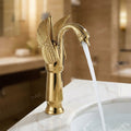 Detail of swan neck spout on gold basin tap, tall body brass basin mixer for modern bathroom